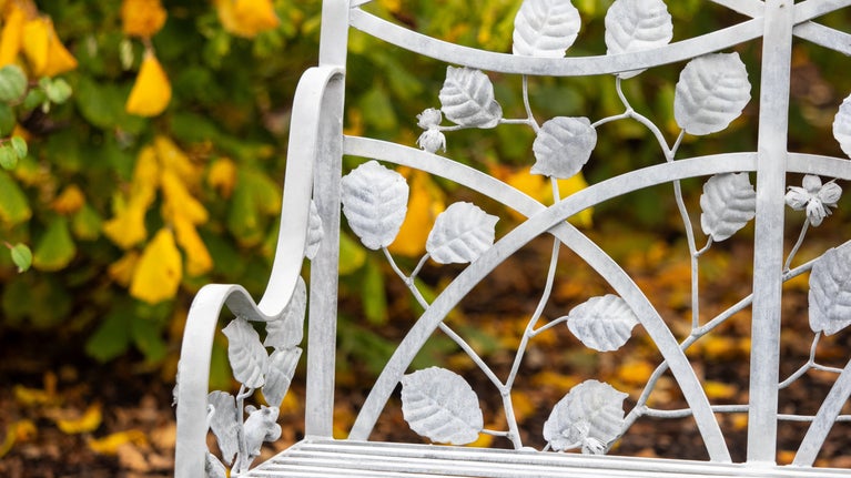 Toby Winterbourn bench with hidden dormouse in Felbrigg's Walled Garden